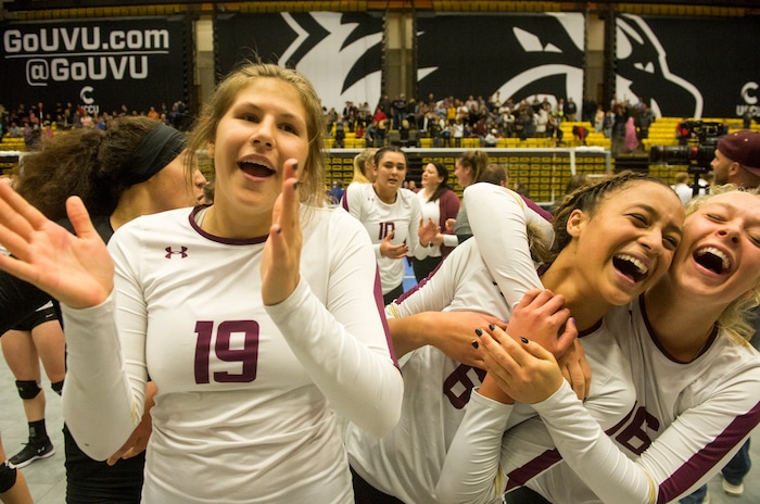 (Rick Egan  |  The Salt Lake Tribune)    The Lone Peak Knights celebrate their win over the Pleasant Grove Vikings, for the 6A volleyball championship, at Utah Valley University, Saturday, November 4, 2017.