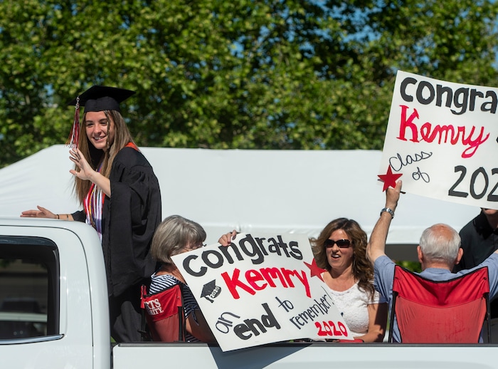 (Rick Egan  |  The Salt Lake Tribune)     Kemry Breur joins the other Alta High seniors in the parade of 2020 graduates in a “drive through” graduation ceremony at Alta High, Thursday, May 28, 2020.