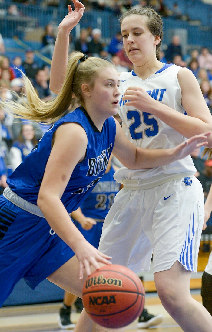 (Leah Hogsten  |  The Salt Lake Tribune) Bingham's Jaycee Lichtie (35) drives in front of Fremont's Emma Calvert (25). tBingham faces Fremont in the championship game of the 6A High School Girls' Basketball Tournament at SLCC in Taylorsville,Saturday, Feb. 24, 2018. 