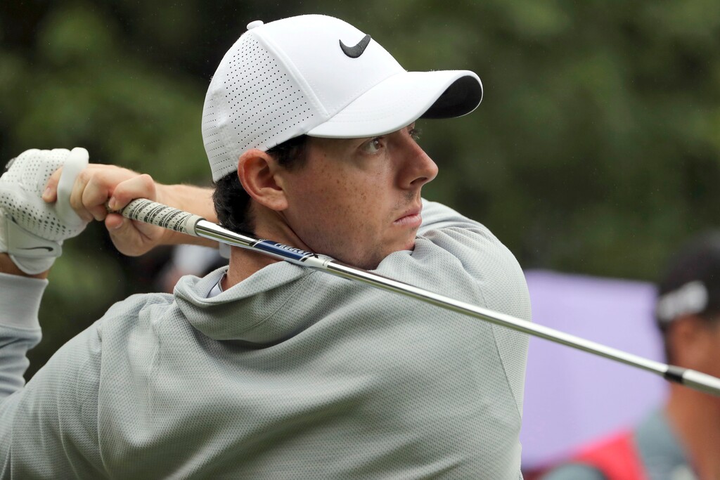 Rory McIlroy, hitting a tee shot during the WGC-HSBC Champions in January, gets off to a good start at the Firestone Invitational with a 3-under 67. (AP Photo/Ng Han Guan)