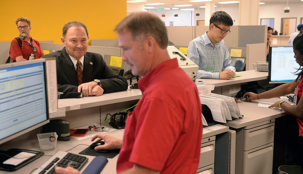 (Al Hartmann | Tribune file photo) Utah Gov. Gary Herbert receives his temporary driver license at the Fairpark Driver License office in Salt Lake City on July 11, 2017.