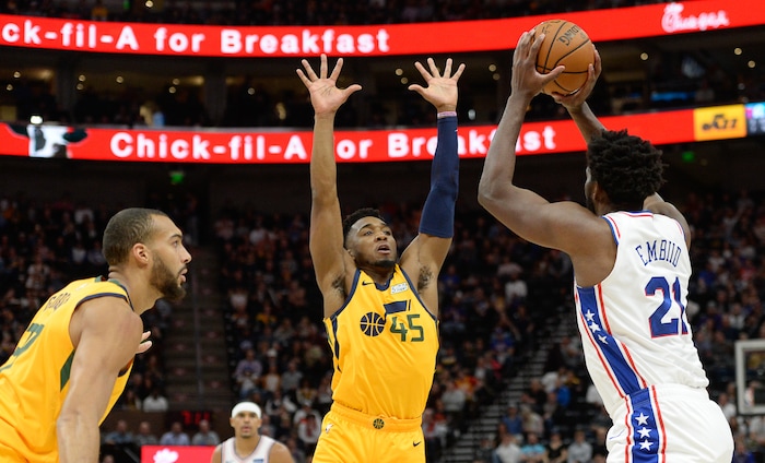 (Francisco Kjolseth  |  The Salt Lake Tribune)  Philadelphia 76ers center Joel Embiid (21) is pressured by Utah Jazz guard Donovan Mitchell (45) as the Utah Jazz host the Philadelphia 76ers in their NBA basketball game at Vivint Smart Home Arena in Salt Lake City on Wednesday, Nov. 6, 2019.