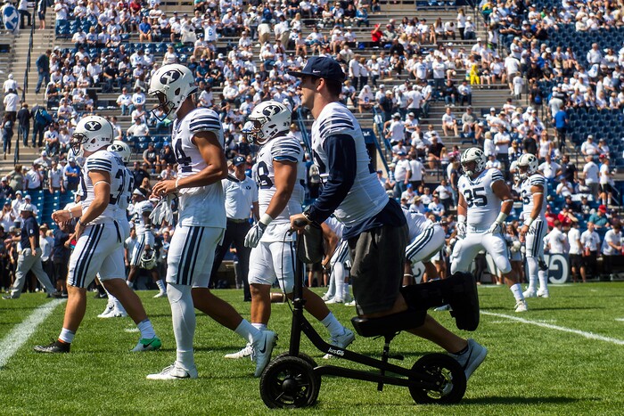 (Chris Detrick  |  The Salt Lake Tribune)   Brigham Young Cougars quarterback Tanner Mangum (12) watches practice before the game at LaVell Edwards Stadium Saturday Saturday, September 16, 2017. 