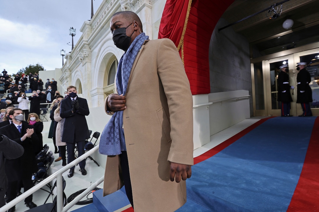 Officer Eugene Goodman, named acting deputy sergeant of arms of the Capitol Police, escorts Vice President-elect Kamala Harris as they arrive for President-elect Joe BidenÕs inauguration, Wednesday, Jan. 20, 2021, at the U.S. Capitol in Washington. (Jonathan Ernst/Pool Photo via AP)