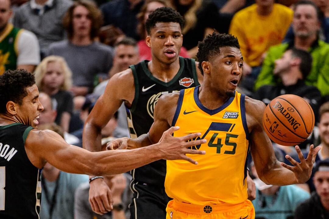 (Trent Nelson | The Salt Lake Tribune)  Utah Jazz guard Donovan Mitchell (45) bobbles the ball as the Utah Jazz host the Milwaukee Bucks, NBA basketball in Salt Lake City Saturday November 25, 2017.