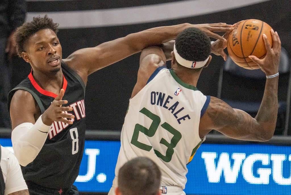 (Rick Egan | The Salt Lake Tribune) Utah Jazz forward Royce O'Neale (23) is fouled by Houston Rockets forward Jae'Sean Tate (8), in NBA action between the Utah Jazz and the Houston Rockets, at Vivint Arena, on Saturday, May 8, 2021.