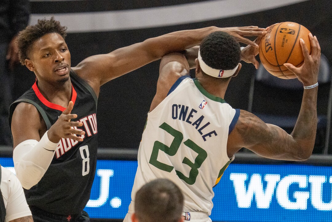 (Rick Egan | The Salt Lake Tribune) Utah Jazz forward Royce O'Neale (23) is fouled by Houston Rockets forward Jae'Sean Tate (8), in NBA action between the Utah Jazz and the Houston Rockets, at Vivint Arena, on Saturday, May 8, 2021.