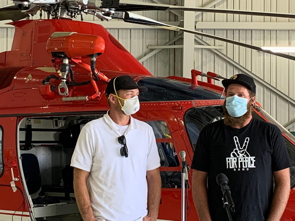 (Photo courtesy of the Davis County Sheriff's Office) Lyle and Brad Berglund are shown at a news conference last summer at the Intermountain Healthcare hangar. The two brothers were awarded the 2021 Carnegie Medal for pulling two people from a plane crash in 2020.