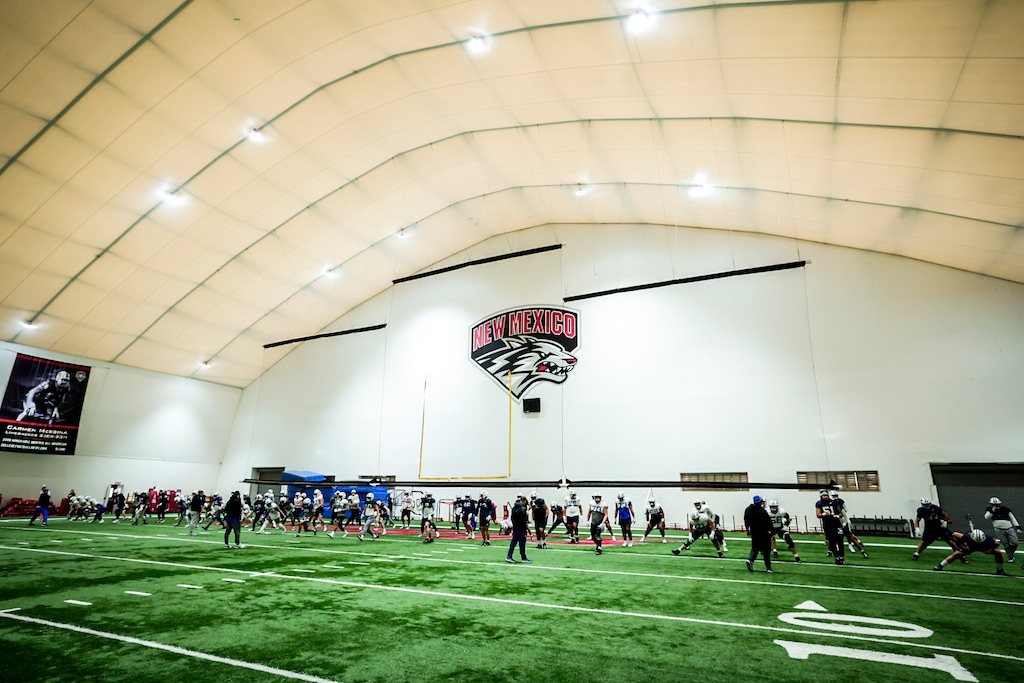 (BYU Athletics) BYU practices for the New Mexico Bowl in the indoor practice facility at UMN.
