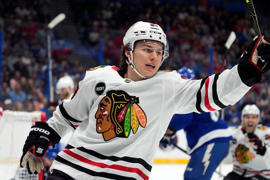 (Chris O'Meara | AP)  Chicago Blackhawks center Connor Bedard (98) celebrates after scoring against the Tampa Bay Lightning in 2023. Bedard scored an overtime winner against the Utah Mammoth on Thursday and then stared down some fans who had been taunting him.