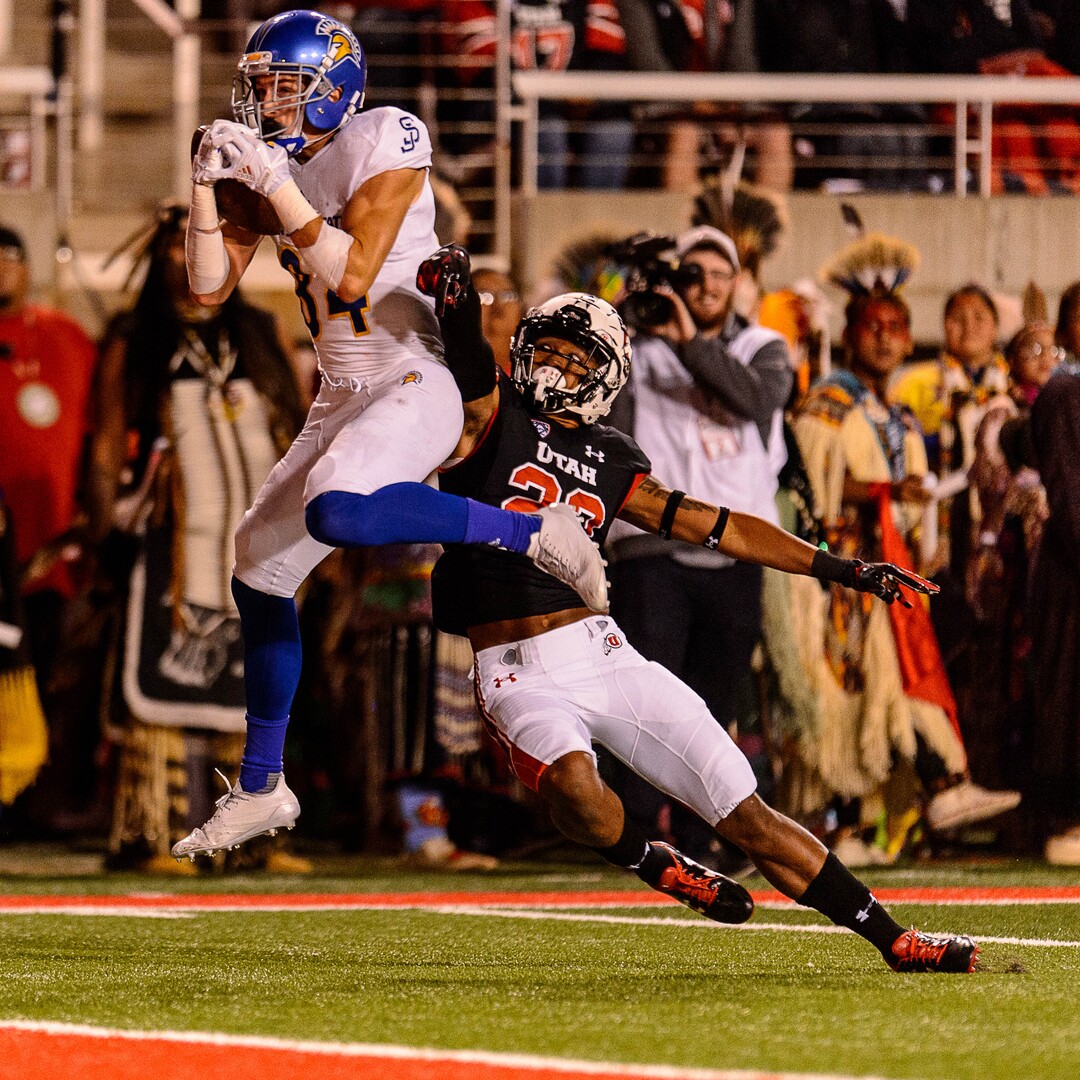(Trent Nelson | The Salt Lake Tribune)  San Jose State Spartans wide receiver Bailey Gaither (84) pulls in a touchdown pass, defended by Utah Utes defensive back Julian Blackmon (23), as the Utah Utes host the San Jose State Spartans, NCAA football at Rice-Eccles Stadium in Salt Lake City, Saturday September 16, 2017.