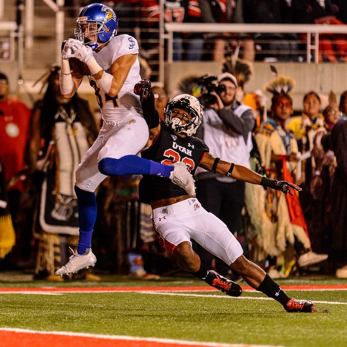 (Trent Nelson | The Salt Lake Tribune)  San Jose State Spartans wide receiver Bailey Gaither (84) pulls in a touchdown pass, defended by Utah Utes defensive back Julian Blackmon (23), as the Utah Utes host the San Jose State Spartans, NCAA football at Rice-Eccles Stadium in Salt Lake City, Saturday September 16, 2017.