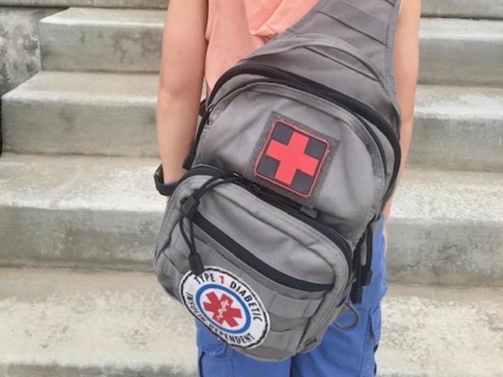 (Photo courtesy of Caly Watkins) Pictured is Caly Watkins' 8-year-old son, who has diabetes and has been told he can't carry his insulin with him at school.