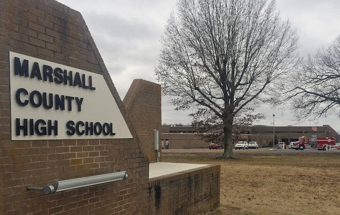 Authorities investigate the scene of fatal school shooting Tuesday, Jan 23, 2018, in Benton, Ky. Kentucky State Police said the suspect was apprehended by a Marshall County deputy. (AP Photo/Stephen Lance Dennee)