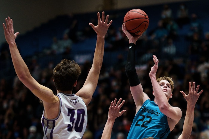 (Trent Nelson | The Salt Lake Tribune) Farmington's Truman Hendry shoots the ball as Lehi faces Farmington High School in the 5A boys basketball state championship game, in Taylorsville on Saturday, March 6, 2021.