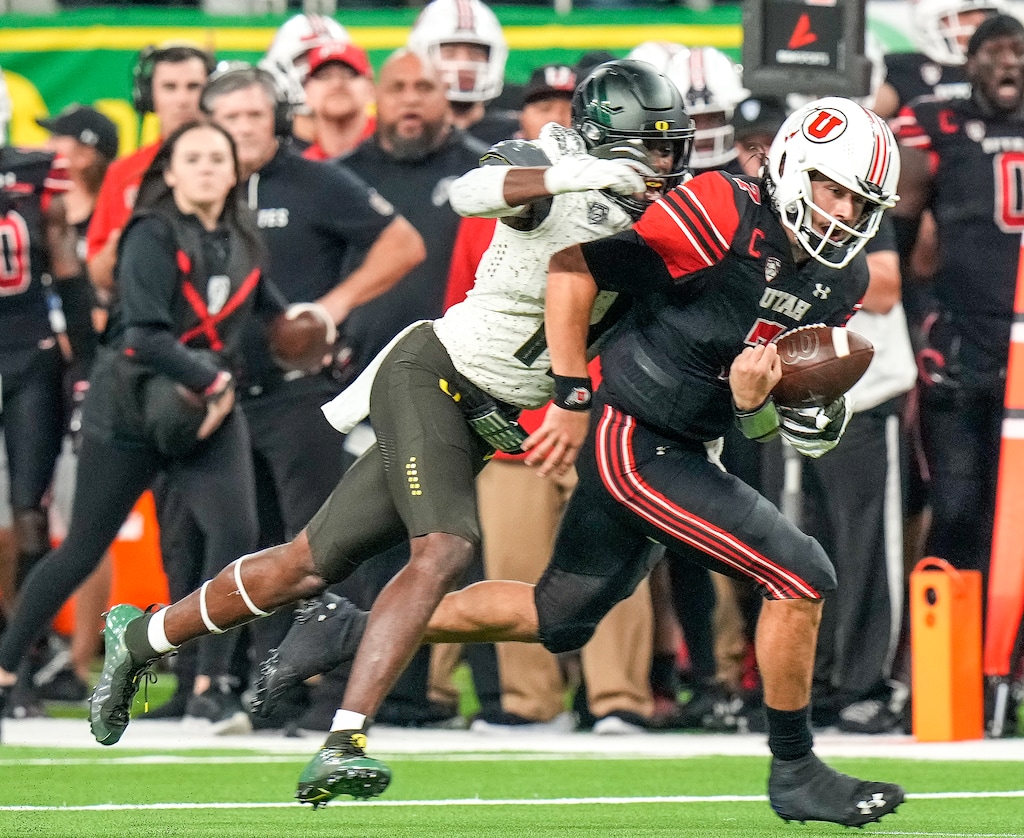 (Leah Hogsten | The Salt Lake Tribune) Utah Utes quarterback Cameron Rising (7) fumbles the ball as the Utes play the Oregon Ducks for the 2021 Pac12 Football Championship title at Allegiant Stadium in Las Vegas, Dec 3, 2021. 