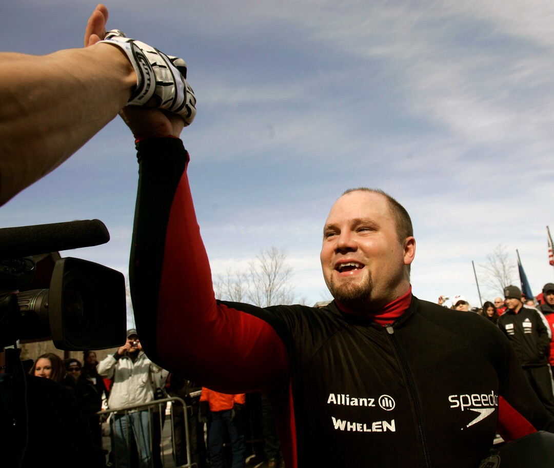 American driver Steven Holcomb celebrates his team's win at the men's Bobsled World Championships in Lake Placid, N.Y., Sunday, March 1, 2009.  (AP Photo/Mike Groll)