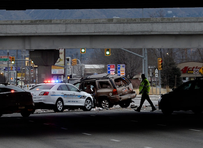Scott Sommerdorf | The Salt Lake Tribune
The scene of a fatal crash on 3500 South, under the I-215 expressway, Sunday, February, 11, 2018.