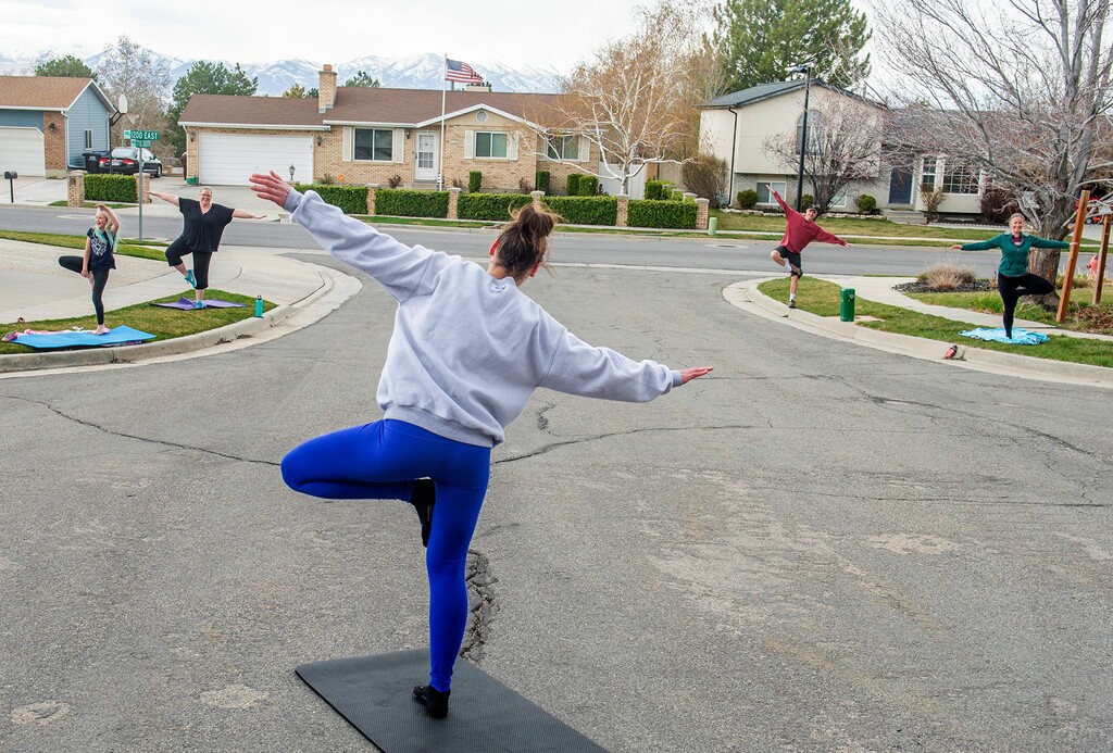 (Rick Egan  |  The Salt Lake Tribune)     Becca Kelly leads her neighbors in Midvale  in a social distance Zumba session, Tuesday, March 24, 2020.