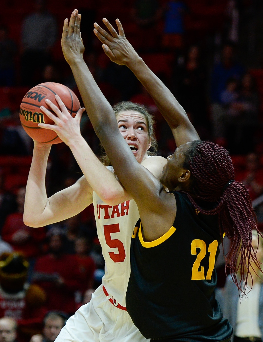 (Francisco Kjolseth  |  The Salt Lake Tribune)  Utah Utes forward Megan Huff (5) looks for an open teammate past Arizona State Sun Devils forward Sophia Elenga (21) in Utes' Pac-12 home opener at the Jon M Huntsman Center on Friday, Jan. 4, 2019. 