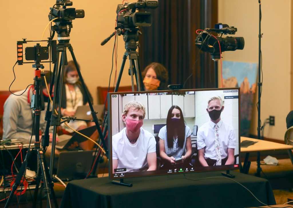 Enterprise High School seniors Broc Gardner, left, Dallee Cobb and Dawson Thelin participate virtually from their school in Enterprise, Washington County, during the weekly COVID-19 briefing at the Capitol in Salt Lake City on Wednesday, Aug. 26, 2020. (Steve Griffin/Deseret News via AP, Pool)
