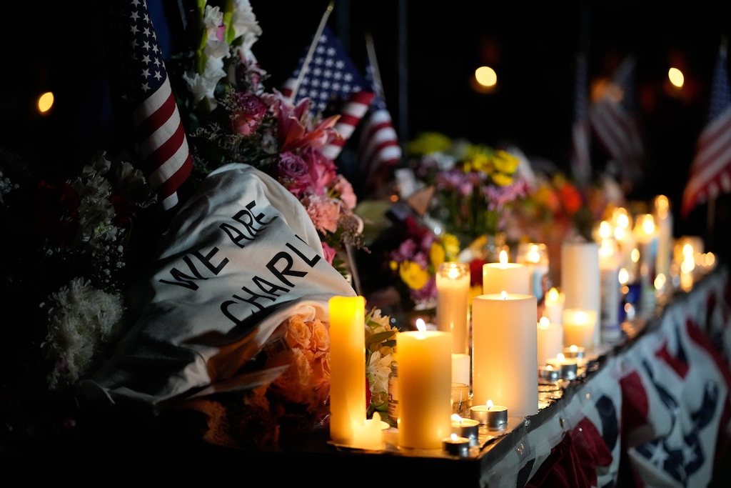 (Francisco Kjolseth | The Salt Lake Tribune) People attend a vigil for Charlie Kirk, the conservative commentator and founder of Turning Point USA who was fatally shot at Utah Valley University in Orem on Wednesday, Sept. 10, 2025, at Memorial Park in Provo, Friday, September 12, 2025.