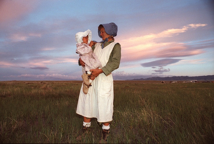 Rick Egan  | Tribune File Photo 

Nanc' Adams holds four-year-old Jackie Adams, Pine Colorado, at sunset near Martins cove, Wyoming.