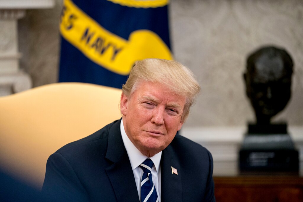 President Donald Trump attends a meeting with American workers on the impact of the tax reform bill in the Oval Office at the White House, Wednesday, Jan. 31, 2018, in Washington. (AP Photo/Andrew Harnik)