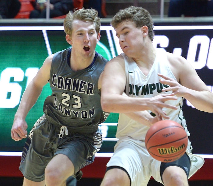 (Leah Hogsten | The Salt Lake Tribune) Corner Canyon's Blake Emery (23) tries to steal from Olympus' Harrison Creer (23). Olympus defeated Corner Canyon 76-49 to win the 5A High School BoysÕ Basketball Tournament Championship at the Jon M. Huntsman Center in Salt Lake City, Saturday, March 3, 2018.