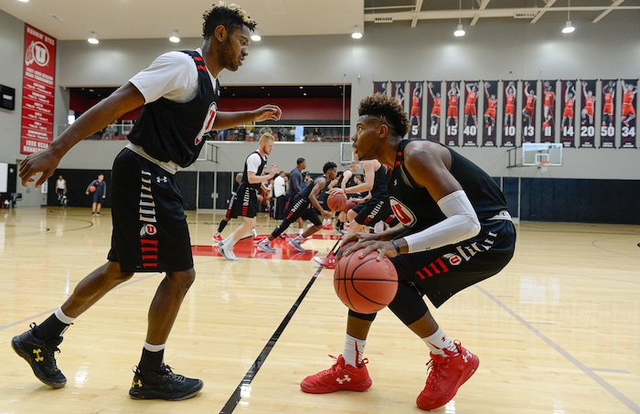 (Francisco Kjolseth  |  The Salt Lake Tribune)  Christian Popoola, left, and Chris Seeley run through drills as the Utah men's basketball program begins fall practices with a fairly new roster of players on Friday, Sept. 29, 2017.