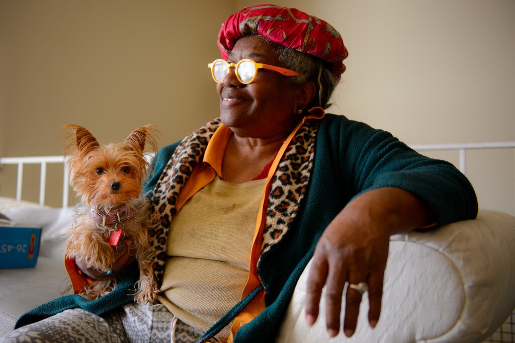(Trent Nelson | The Salt Lake Tribune) The Rev. Nurjhan Govan with "Tiny" at her Taylorsville home on Wednesday, Jan. 6, 2021. Govan was living in her car with 10 Yorkies, who were then taken by Animal Services. She got four of them back and hopes for the rest to be returned sometime this spring.