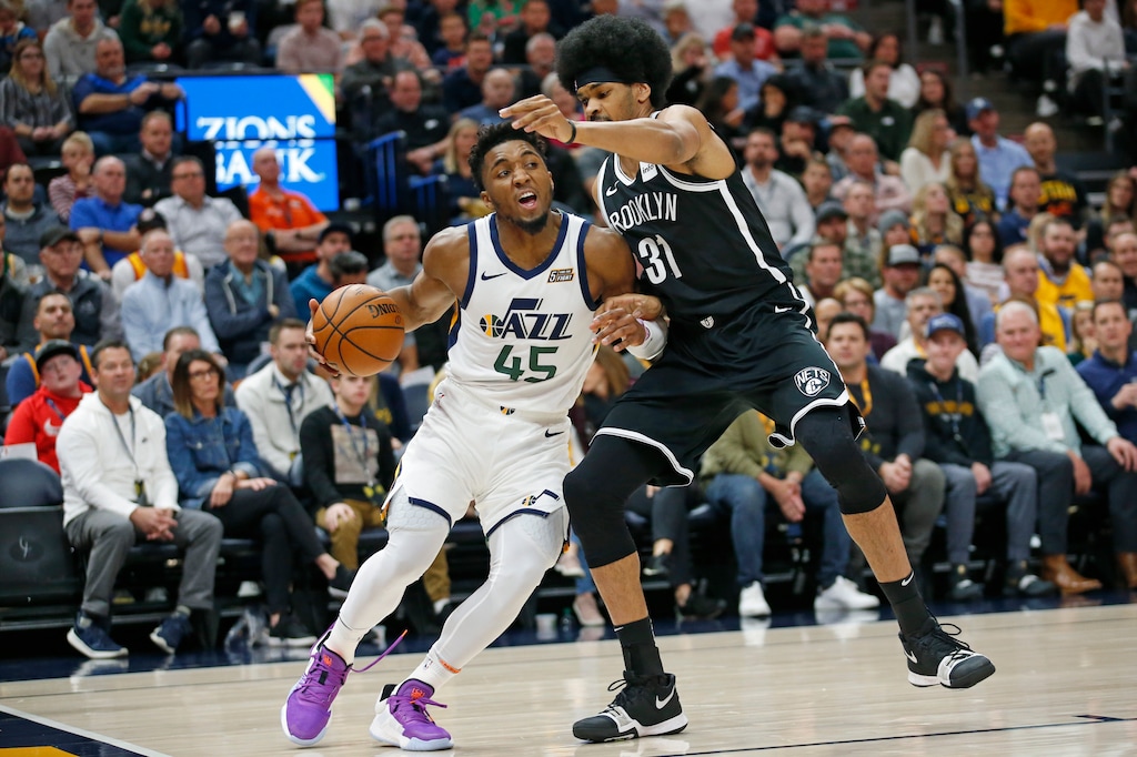 (Rick Bowmer | AP) Brooklyn Nets center Jarrett Allen guards Utah Jazz guard Donovan Mitchell in the first half during an NBA basketball game Tuesday, Nov. 12, 2019, in Salt Lake City.