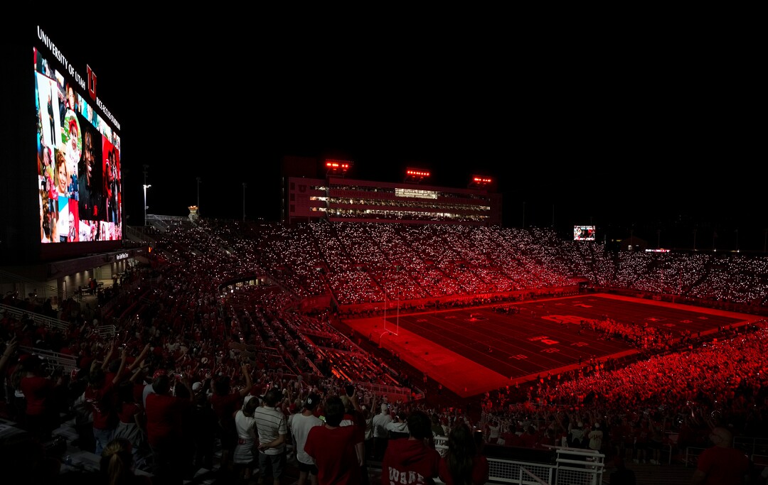 (Bethany Baker  |  The Salt Lake Tribune) Thousands of people hold up their phone flashlights between the third and fourth quarters, a Utah Utes tradition to honor two former players who died, during the second half of the game between the Utah Utes and the Idaho Vandals at Rice-Eccles Stadium in Salt Lake City on Thursday, Sept. 3, 2026.