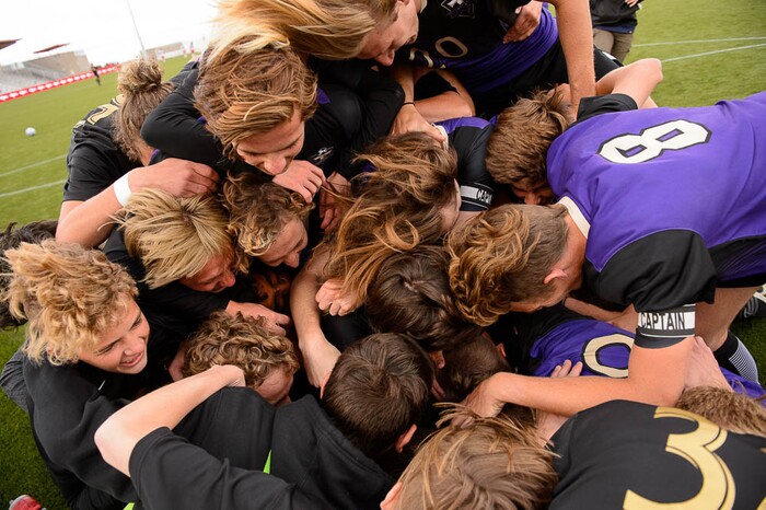 (Trent Nelson | The Salt Lake Tribune)  Desert Hills players celebrate their win over Park City High School in the 4A state championship game, Saturday May 12, 2018.