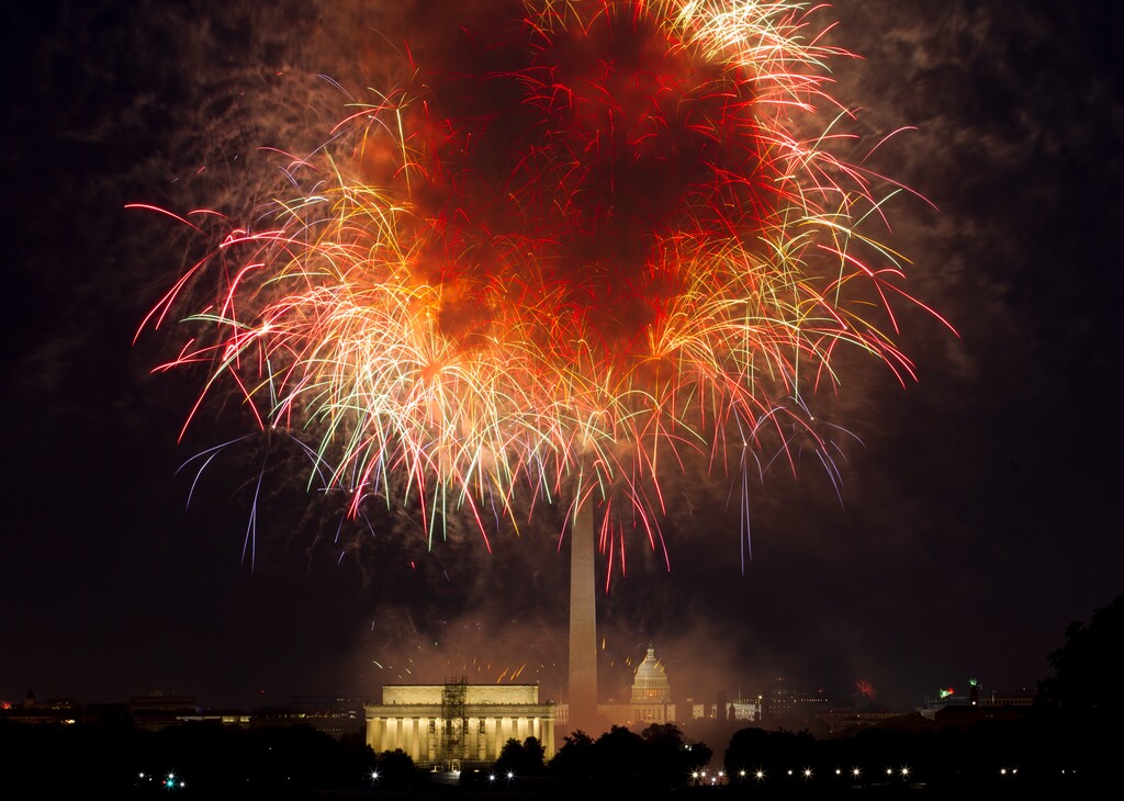 FILE - In this July 4, 2018, file photo, fireworks explode over Lincoln Memorial, Washington Monument and U.S. Capitol, along the National Mall in Washington, during the Fourth of July celebration. Independence Day is just over three weeks away, and nobody in Washington seems to know exactly what the July 4 celebrations in the nation’s capital will look like. President Donald Trump has stated he wants to reshape the annual event into a “Salute to America” that would feature Trump himself speaking from the steps of the Lincoln Memorial. (AP Photo/Jose Luis Magana, File)