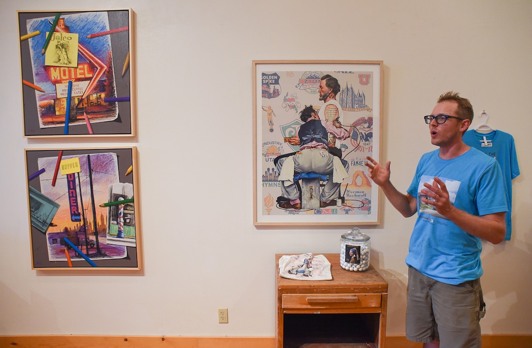 (Francisco Kjolseth  |  The Salt Lake Tribune)  Artist Ben Steele describes some of his paintings, including a copy of "Mormon Rockwell," one of twelve prints made from the much larger original during the monthly gallery stroll in downtown Helper, Utah on Friday, Aug. 2, 2019.