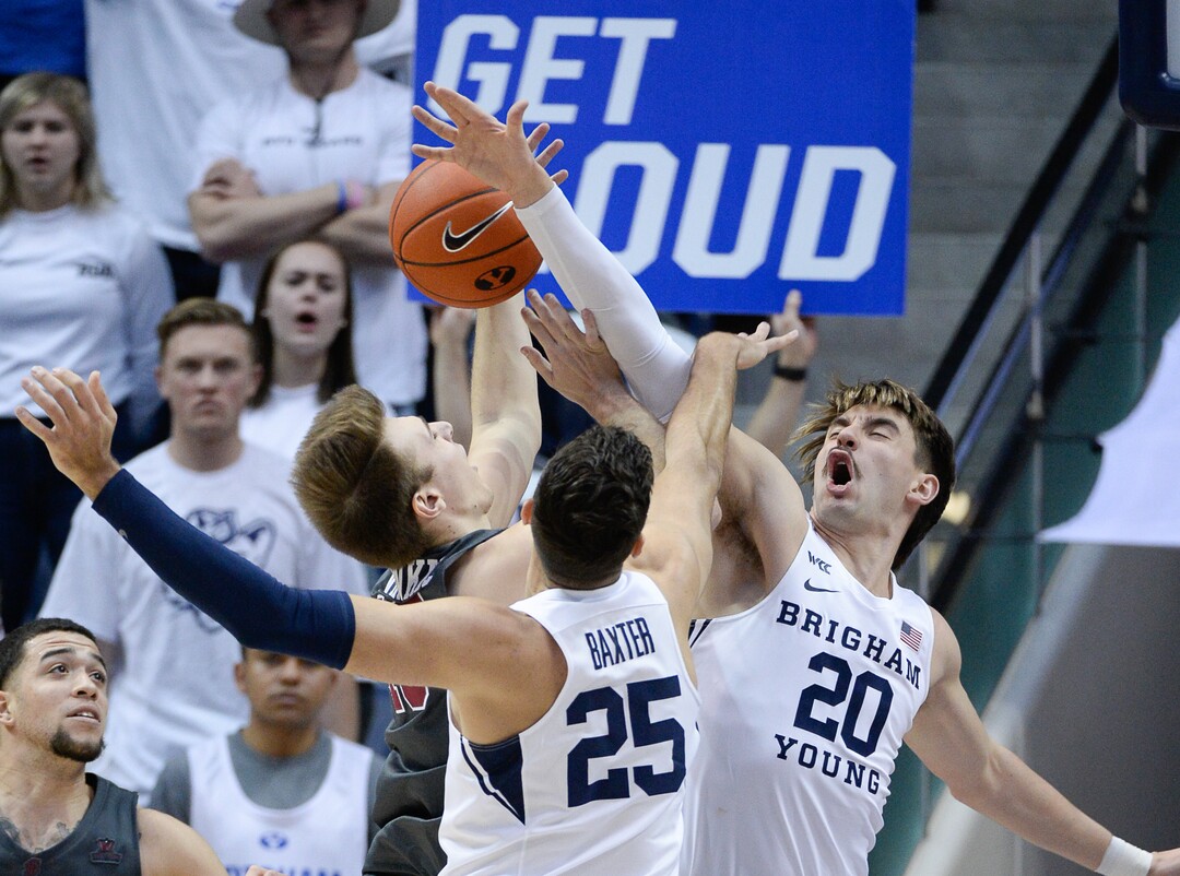 (Francisco Kjolseth  |  The Salt Lake Tribune) Santa Clara Broncos forward Josip Vrankic (13) hits a wall put up by Brigham Young Cougars forward Gavin Baxter (25) and Brigham Young Cougars guard Zac Seljaas (20) in the second half as the Brigham Young Cougars host the Santa Clara Broncos at the Marriott Center in Provo, Thursday, Feb. 20, 2020. BYU won 85-75.