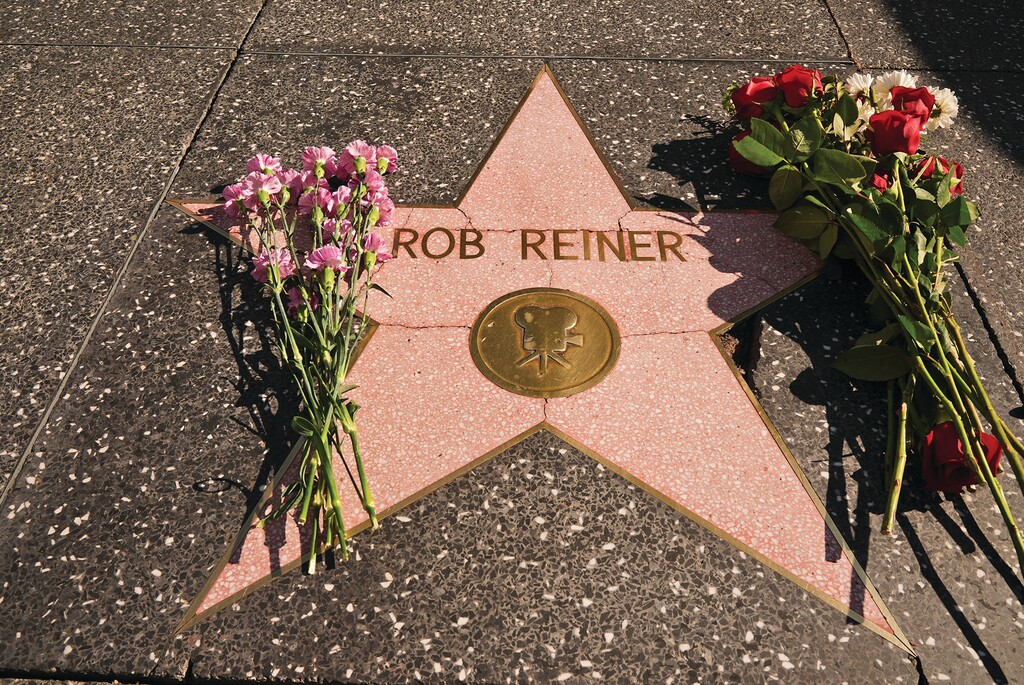 (Damian Dovarganes | AP Photo) Flowers cover the Walk of Fame star for Rob Reiner on Monday, Dec. 15, 2025, in the Hollywood section of Los Angeles. 