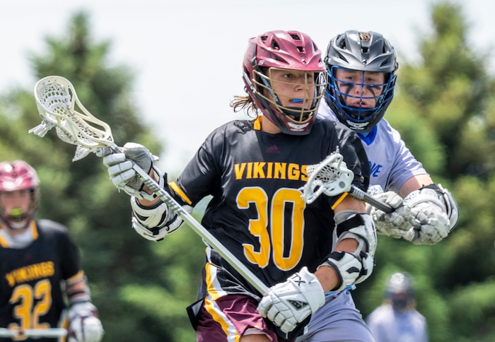 (Rick Egan | The Salt Lake Tribune) Mason Hepworth Viewmont, runs with the ball, as Kolton Bayles defends for Pleasant Grove, in the Division C championship game between the Viewmont Vikings and the Pleasant Grove Vikings, in Layton, on Saturday, May 29, 2021.