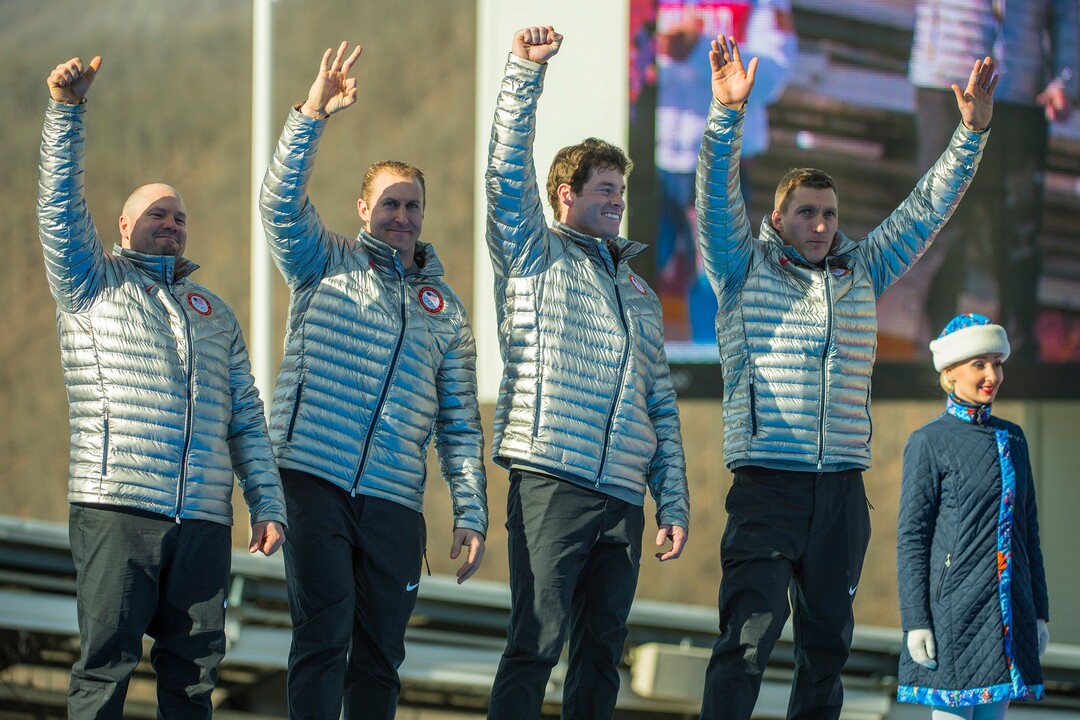 KRASNAYA POLYANA, RUSSIA  - JANUARY 23:USA's Steven Holcomb, Chris Fogt, Curtis Tomasevicz, and Steve Langton, celebrate during the medal ceremony at the finish of the four-man bobsled at Sanki Sliding Center during the 2014 Sochi Olympics Sunday February 23, 2014. They won the bronze medal with a cumulative time of 3:40.99. (Photo by Chris Detrick/The Salt Lake Tribune)