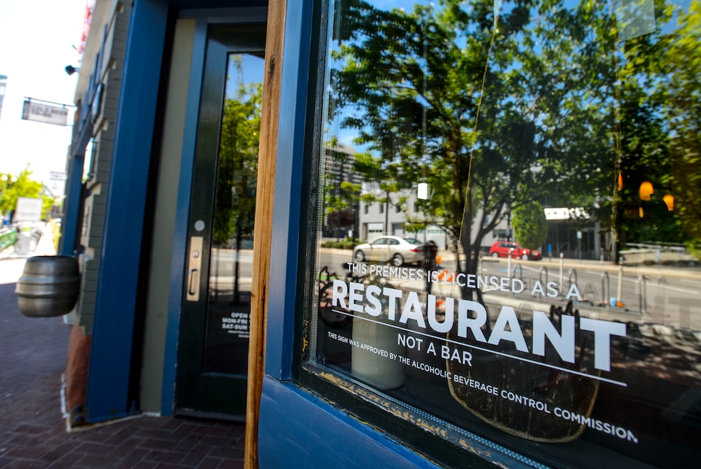 (Steve Griffin  |  The Salt Lake Tribune) Utah restaurants that serve alcohol can officially take down their "RESTAURANT NOT A BAR" signs like this one at Squatters in Salt Lake City on Tuesday.