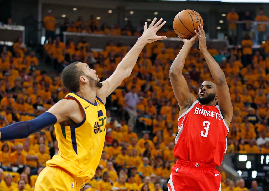 Utah Jazz center Rudy Gobert (27) defends against Houston Rockets guard Chris Paul (3) during the first half in Game 4 of an NBA basketball second-round playoff series Sunday, May 6, 2018, in Salt Lake City. (AP Photo/Rick Bowmer)