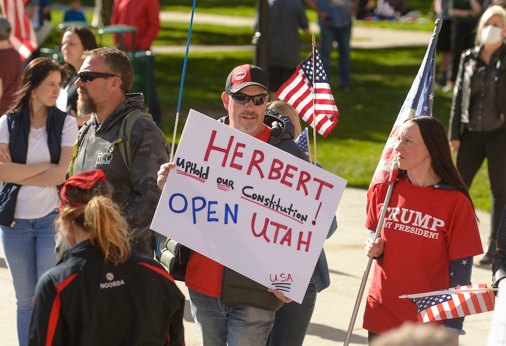 (Leah Hogsten  |  The Salt Lake Tribune)  About 1,000 people protested the government mandated shutdown of businesses on the grounds of Salt Lake City Hall, Saturday. The protest was organized by Utah Business Revival aimed at Mayor Erin Mendenhall, Salt Lake County Mayor Jenny Wilson and Governor Gary Herbert policies on COVID-19 and social distancing, April 18, 2020.