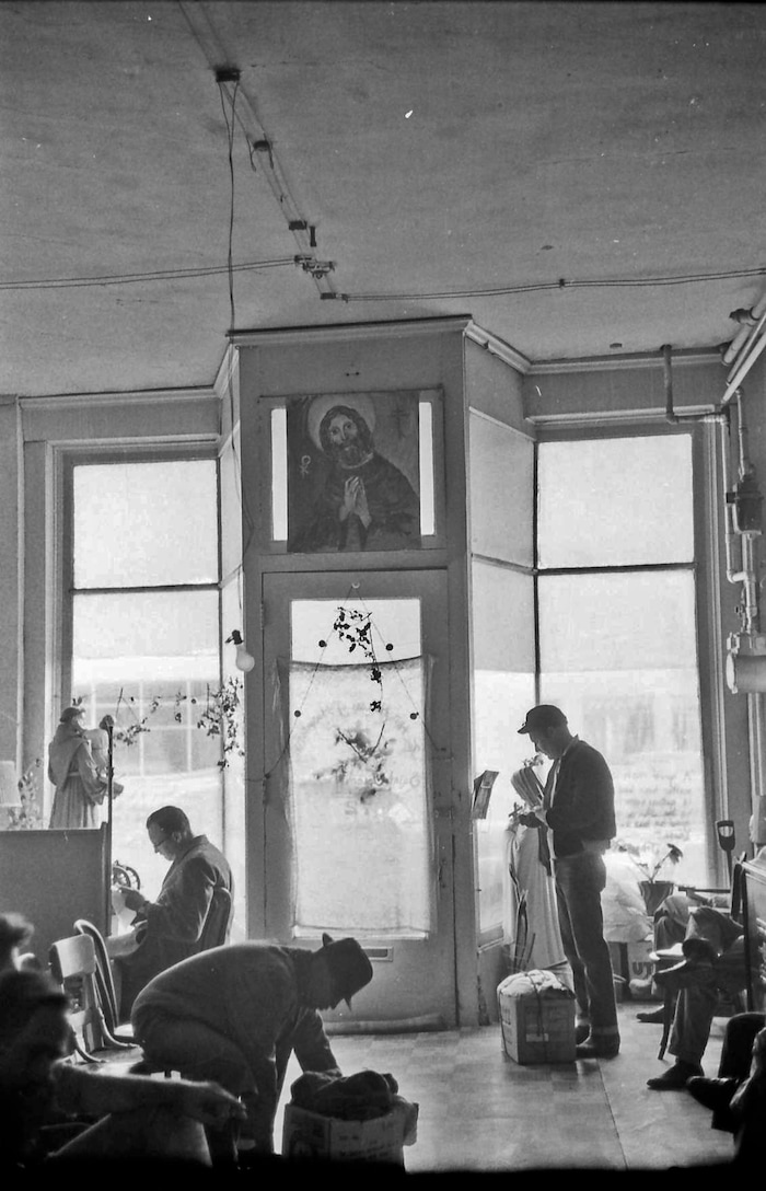 (photo courtesy Jerry Currier)  A group of men hang around the Joe Hill House of Hospitality in downtown Salt Lake City in 1961. Ammon Hennacy, a member of the Catholic Worker movement, opened the location on what is now Market Street as a homeless shelter in Nov. 1961, serving up to 60 people a day free of charge.