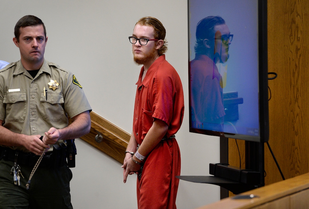 (Scott Sommerdorf   |  The Salt Lake Tribune)   Defendant Tyerell Joe Przybycien, 18, of Spanish Fork, returns to court following a break that was taken after the video showing the hanging death was shown during his preliminary hearing, Wednesday, August 23, 2017.  Przybycien is charged with first-degree felony murder for buying items used by a 16-year-old girl to hang herself on May 5 in Utah County.  Przybycien also recorded the girl's death, according to charges.