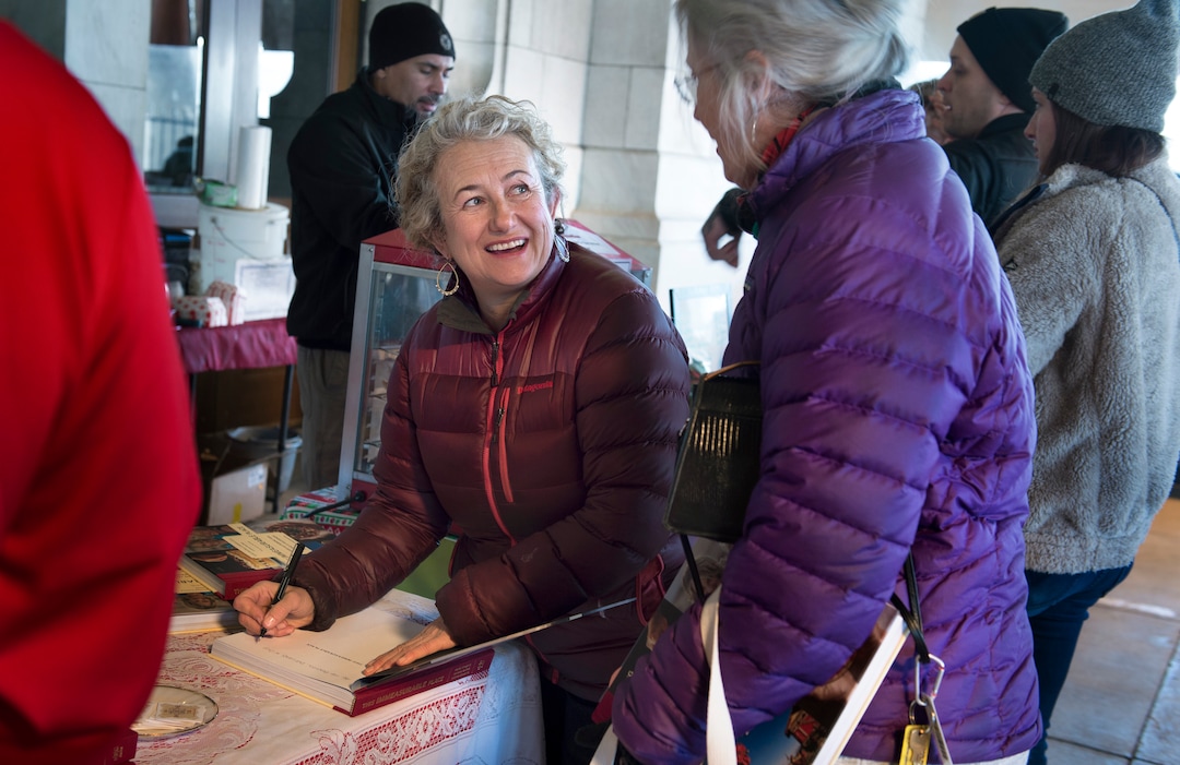 (Scott Sommerdorf   |  The Salt Lake Tribune)   Blake Spalding, co-owner of Hell's Backbone Grill in Boulder, signs a copy of the new cookbook, "This Immeasurable Place: Food and Farming from the Edge of Wilderness," for Margie Batson, December 9, 2017.  