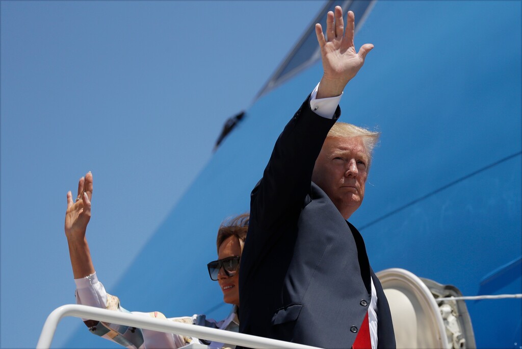 President Donald Trump and first lady Melania Trump board Air Force One for a four-day state visit to Japan, Friday, May 24, 2019, at Andrews Air Force Base, Md. (AP Photo/Evan Vucci)