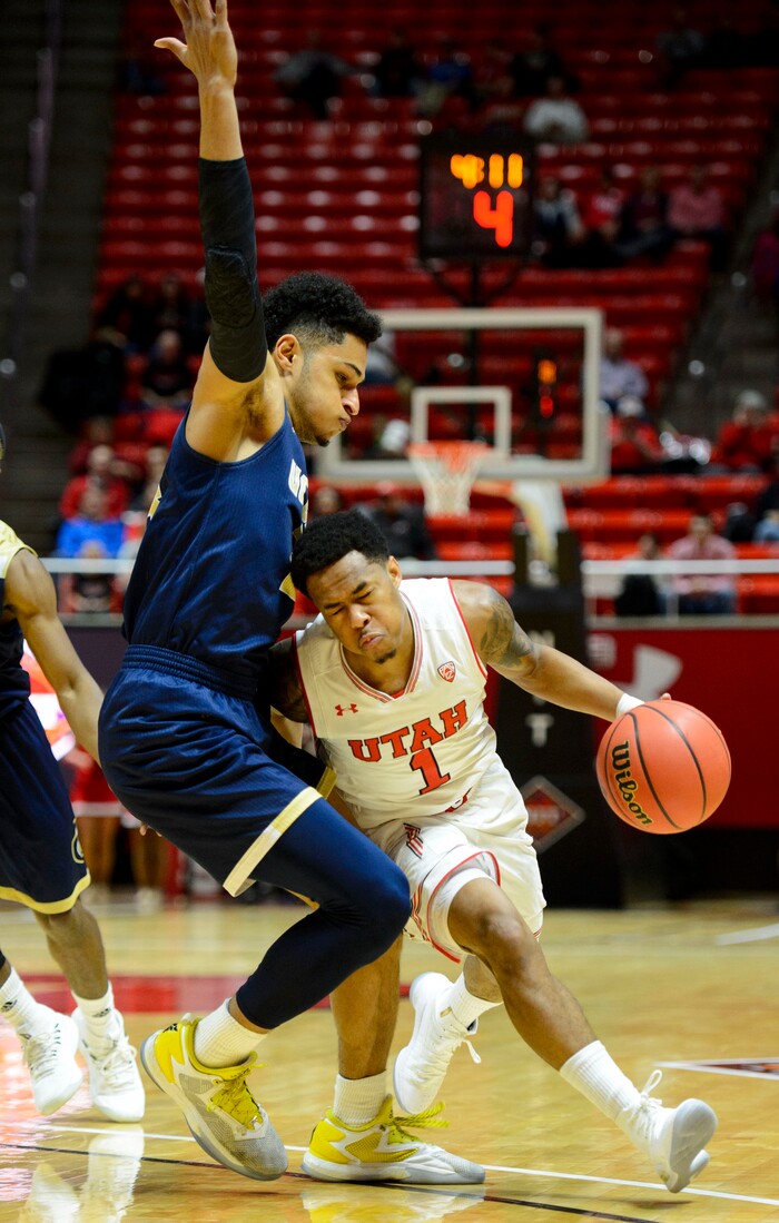 (Steve Griffin  |  The Salt Lake Tribune)  Utah Utes guard Justin Bibbins (1) drives up court during the Utah versus UC Davis men's NIT basketball game at the Huntsman Center in Salt Lake City Wednesday March 14, 2018.