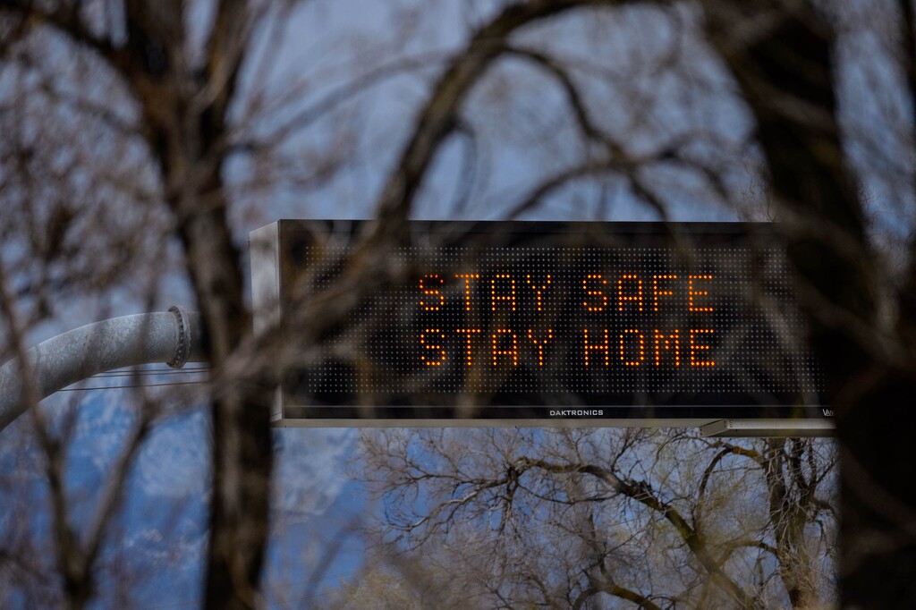 (Trent Nelson  |  The Salt Lake Tribune) A digital sign over I-80 reads, "Stay Safe Stay Home," in Salt Lake City on Wednesday, April 1, 2020.