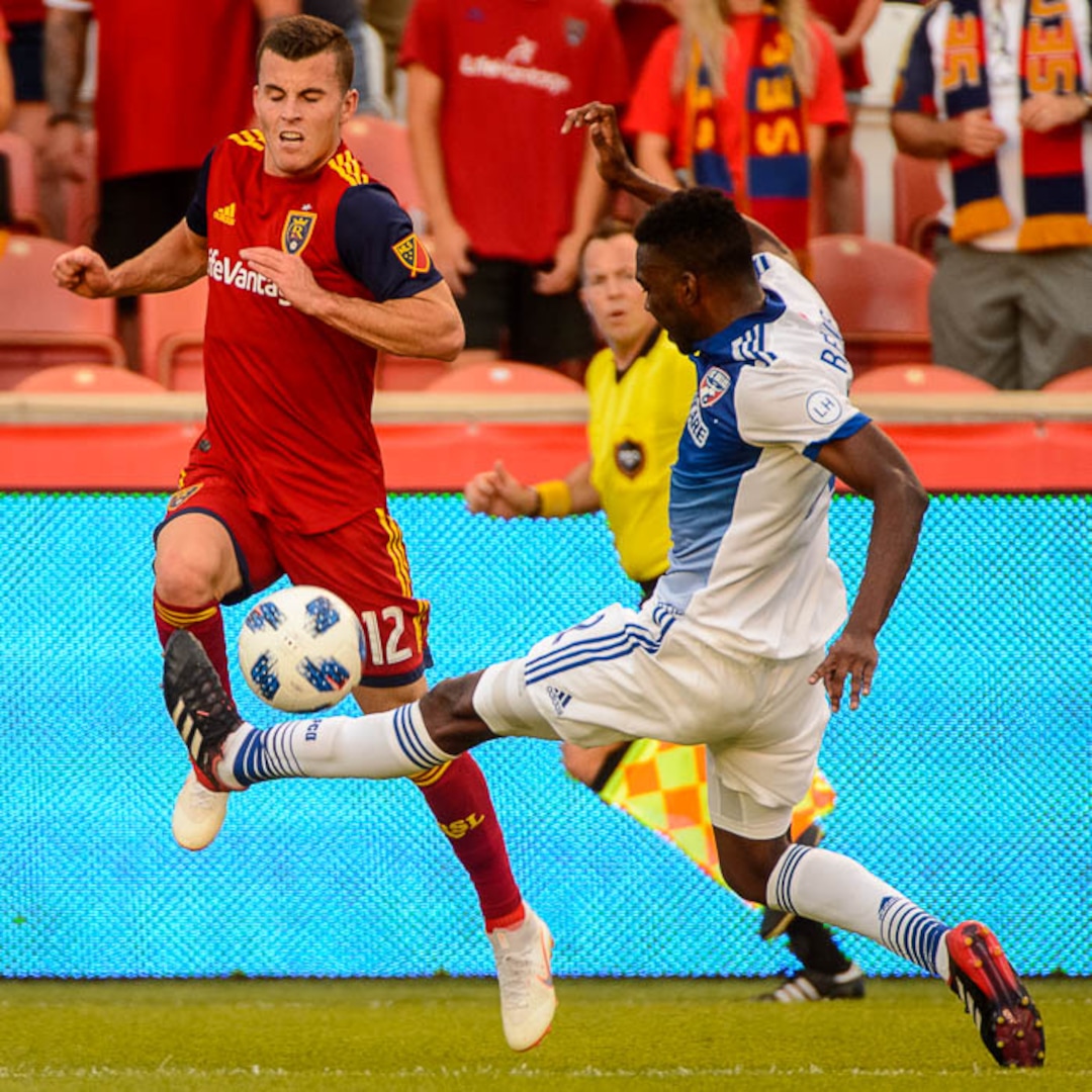 (Trent Nelson | The Salt Lake Tribune)  Real Salt Lake hosts FC Dallas, MLS soccer at Rio Tinto Stadium in Sandy, Saturday July 7, 2018. Real Salt Lake forward Brooks Lennon (12) and FC Dallas defender Kris Reaves (32).